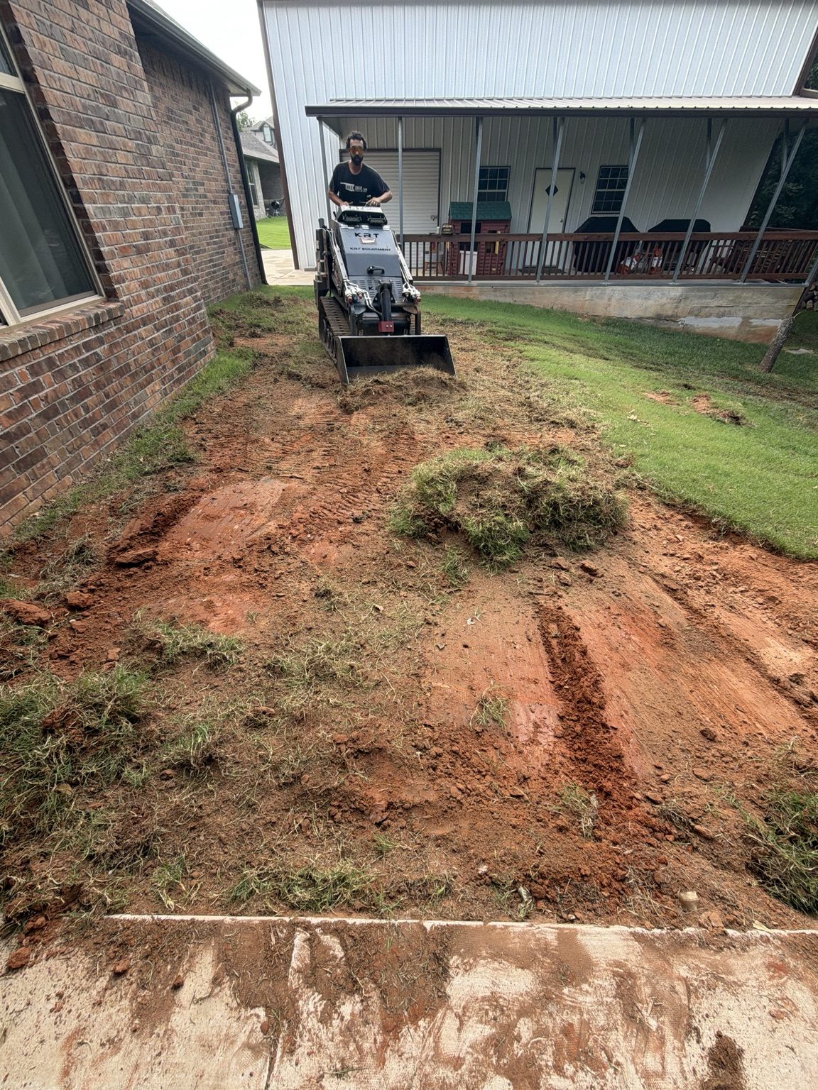 Freshly graded dirt beside home