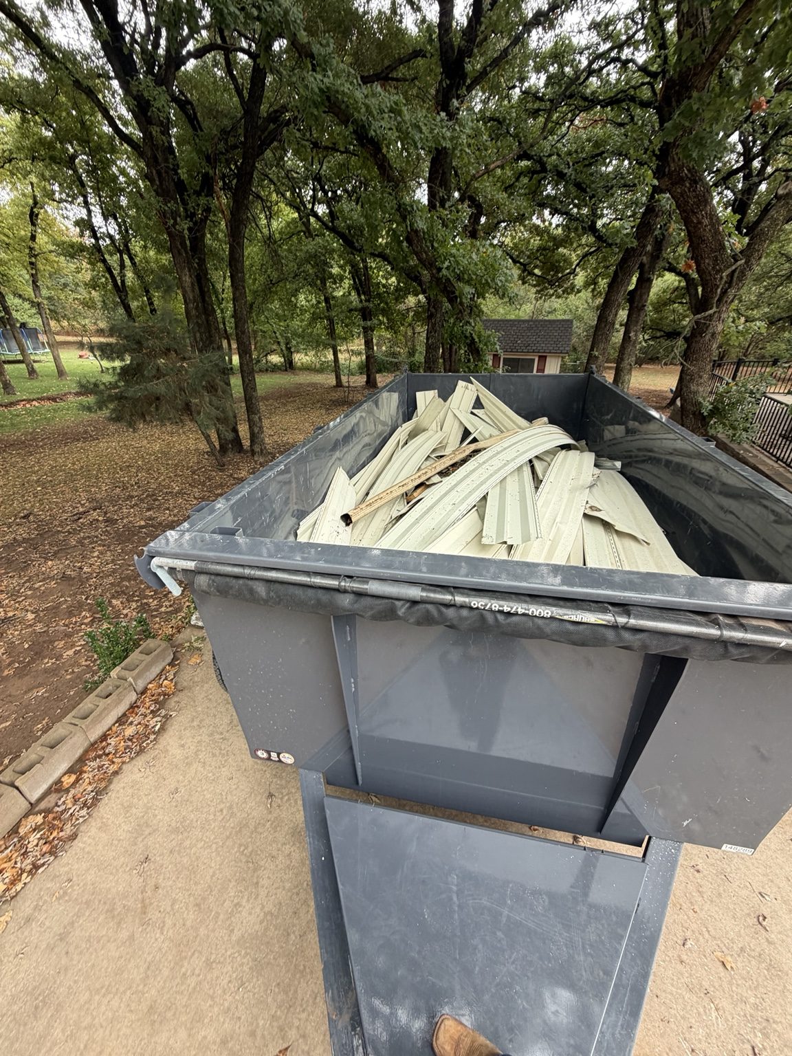 Dump trailer loaded with construction debris