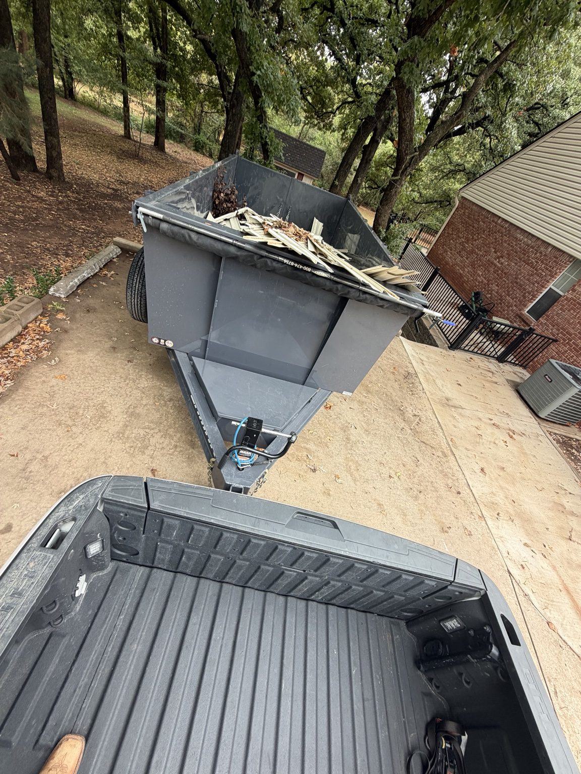 Dump trailer loaded with debris